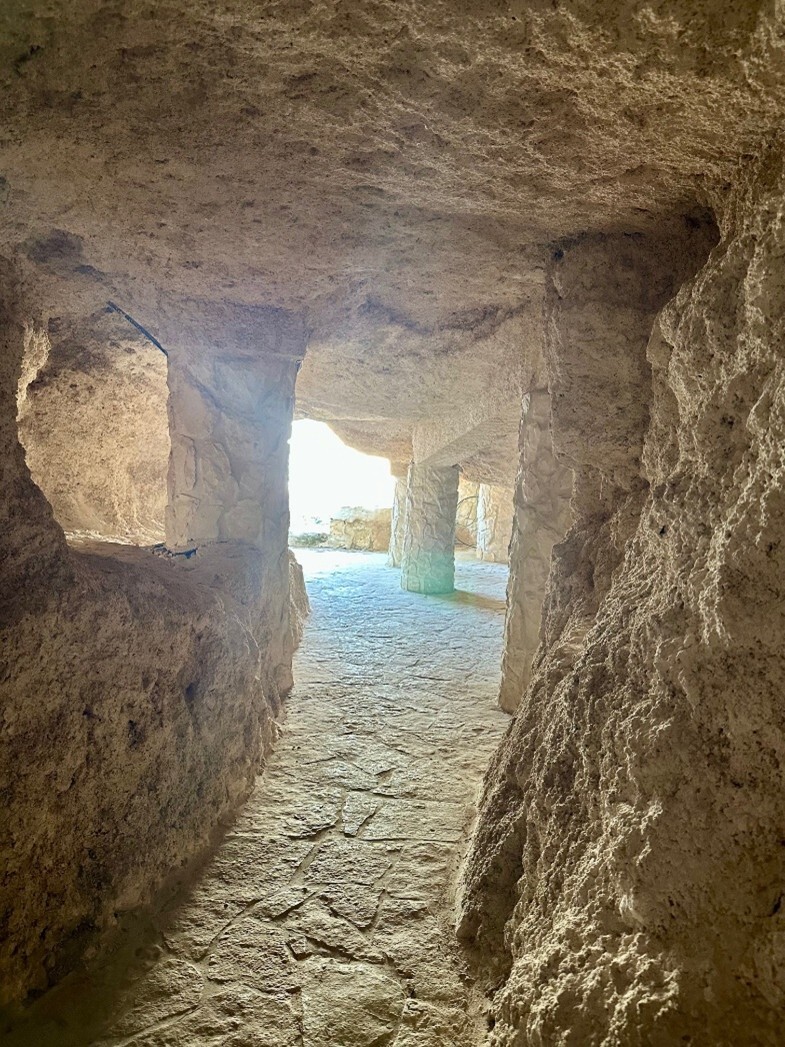 cave with sun shining in background
